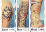 Aland set of 3 stamps showing tattoos.