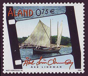 Aland stamp showing fishing boat in film frame.