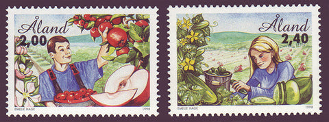 Aland set of 2 stamps showing apples and cucumbers being harvested.
