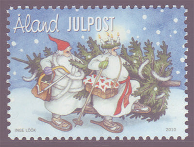 Aland stamp showing  cartoon elves, christmas tree and snowshoes 