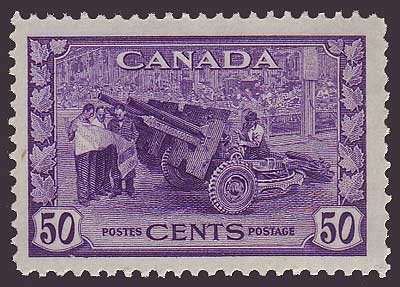Canada Stamp from 1942 showing factory workers assembling field artillery piece.