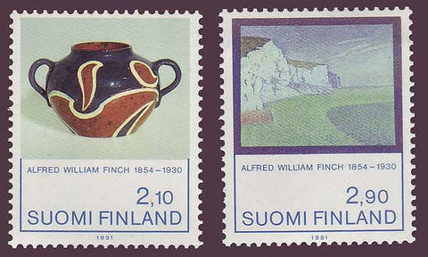 Art and sculpture on stamps.  Ceramic pot with 2 handles in brown and blue, and a landscape painting. 