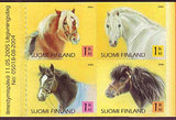 booklet pane of 4 Finland stamps showing different breeds of horses.
