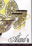Aland Year Set cover showing handcrafted dinnerware.